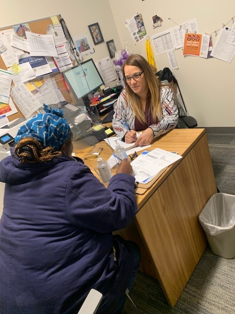 Ivette Velez assists a PGW customer at the New Kensington Community Development Center.
